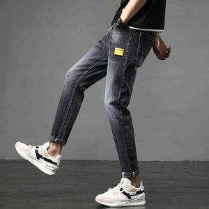 Produits européens légers de luxe Grande poche Jeans bleu Département foncé Vêtements pour hommes Lâche Petit tube droit Mode Chat Scratch Jeunesse