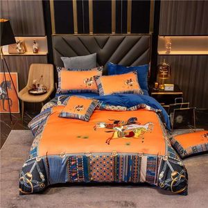 Ensembles de literie design orange de luxe soie or cheval imprimé reine taille housse de couette drap de lit mode taies d'oreiller couette ensemble