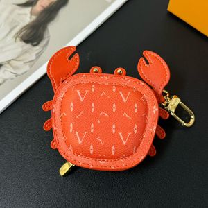 Porte-clés en cuir de luxe à la mode 6 couleurs pendentif de crabe porte-clés peut mettre de la monnaie Widget d'écouteur mini sac d'argent porte-monnaie porte-clés unisexe ornement de carton