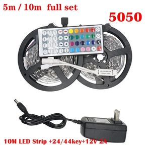 Venta del fabricante Tira de luz LED smd 5050 5M 10M IP20 IP65 RGB Luz LED 300 600 Leds Cinta Cinta LED Flexible Mini controlador IR Adaptador DC12V Juego completo de tiras