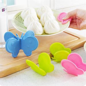 Tapis tampons 2 pièces, Clip de plaque en Silicone résistant à la chaleur avec aimant autocollant de réfrigérateur, pince de bol d'isolation de cuisine papillon