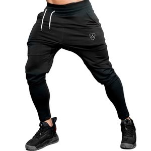 Men Joggers de algodón Pantalones de chándal Running Sport Skinny Pants Gym Fitness Training Fitness pantalones Crossfit de la marca Male Sportswear Pantalones 240418