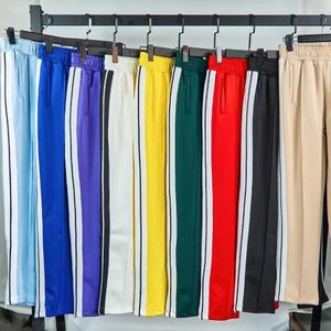 Ropa deportiva de diseñador para hombre Chaqueta para mujer Chándal Ropa deportiva para mujer Palm Pantalón para hombre Sudadera con alfabeto Manga larga Chaqueta de ángel para hombre Pantalones deportivos para correr