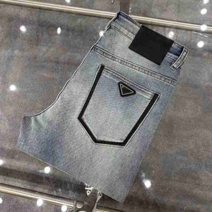 Jeans pour hommes Designer de mode hommes imprimés triangle étiquette lettres vintage lavage jeans lâche stretch droit résistant à l'usure rangée supérieure patch pantalon décontracté ZE2S