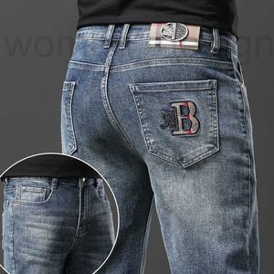 Jeans para hombres Diseñador de lujo Otoño e invierno Nuevo Lujo ligero Edición coreana Pies elásticos gruesos Slim Fit Moda Humo Gris B Inicio EYTY