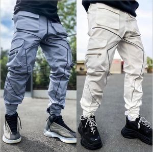 Pantalones de hombre otoño 2021 diseño de tira reflectante Jogger hombres holgados pantalones de trabajo de gran tamaño marea cordón apertura de pierna