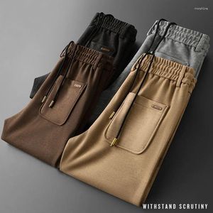 Pantalons pour hommes Kaki Light Luxury Sports Casual pour hommes Automne et hiver épais tricoté Jacquard européen laine pantalons de survêtement