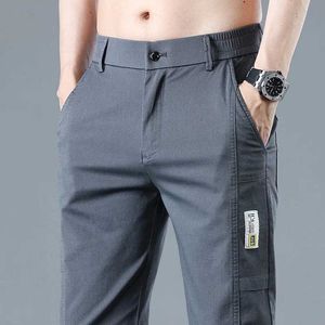 Pantalon masculin pour hommes vêtements pantalon élastique printemps et été nouveau ultra-mince affaires pantalon doux classique mode confortable noire gris chameau Q240429