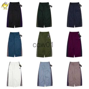 Pantalons pour hommes Aiguilles multicolores Pantalons à jambes larges Hommes Femme 1 1 Casual High Street Classique Papillon Broderie Sangle latérale Pantalon rayé J231028