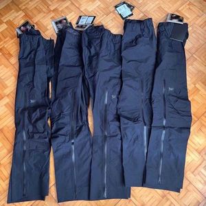 Pantalones rectos de secado rápido al aire libre para hombres Pantalones de chándal para pantalones de diseño de arco de diseño de la cremallera Nylon Nylon impermeable pantalones deportivos