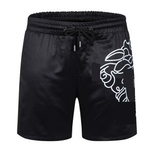 Shorts pour hommes Pantalons de plage Hommes créateur de mode tissu imperméable été hommes Shorts marque vêtements maillots de bain pantalons de plage en nylon shorts de bain M-3XL