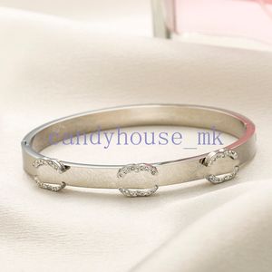 Hommes bracelet pour femmes du bracelet bracelet fausse en cuir marque de fleur de fleur bracelets cristal 18k doré