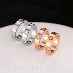 Anillos de diseñador para hombre anillos de oro chapados para mujer fiesta de diamantes de imitación metal romántico pequeños bagues punk decoración de moda retro anillo de bodas popular C23