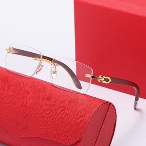 Gafas de sol de diseñador para hombre Gafas de corte de madera sin montura Cuerno de búfalo Marco de madera Lente negra Moda ins red roja Mismos hombres y mujeres gafas de sol vintage con gafas de caja