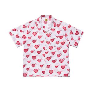 Camisetas de diseñador para hombre Fashion 20ss Pocket Camiseta de manga corta llena de amor hawaii lo suelto casual high street s-xlmen's hombres