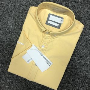 Camisetas para hombre Camisas casuales bordado de manga corta tallas grandes Hombres Clásico Business Botón Solapa Slim fit Camisa de alta calidad Camisa de color sólido para hombres Simplicidad elegante