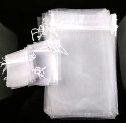 100 pcs/lot vente chaude 4 tailles blanc Organza bijoux pochette cadeau sacs pour faveurs de mariage, perles, bijoux