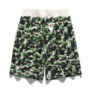 Par verde militar con camiseta para hombre Mans Camuflaje al aire libre Pantalones cortos de ocio Gimnasio Correr Bronceado Jeans Pantalones de baloncesto Ropa de mujer