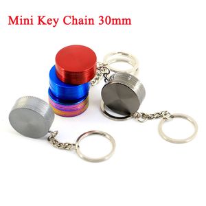 Mini pequeños molinillos de hierbas 30 mm de diámetro 4 capas Llaveros Estilo Aleación de zinc Molinillo de mano portátil mental Trituradora de tabaco Herramientas para Dab Rigs Accesorios para fumar