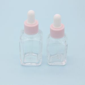 Frasco cuentagotas cuadrado de aceite esencial de 20 ml, frascos de suero de vidrio transparente de 30 ml con tapa rosa para cosméticos