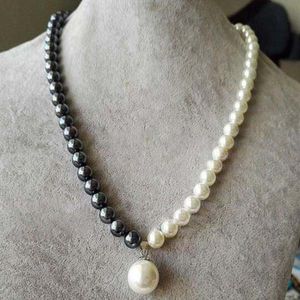 Natural 8-9 mm mer du sud du paon tahitien collier de perle noir 14K