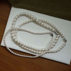 Collar collar de diseño, collar de perlas, cadena de clavícula retro francesa de lujo de lujo de luz de mujeres, mujeres de diseño de collar de cadena de cuello nuevo