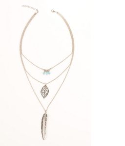 Colliers pendentifs bijoux mode Vintage perles bleues plaqué or/argent évider alliage feuille plume 3 couches clavicule colliers