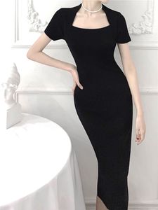 Nuevo otoño francés Vintage estilo Hepburn pequeño vestido negro cuello cuadrado Sexy cuello abierto ajustado vestido de punto envuelto cadera dividida