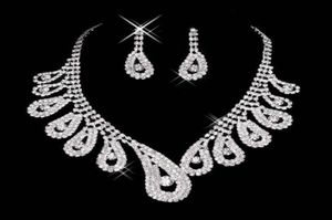 Nuevo juego de joyas de novia de cristal bling barato Pendientes de diamantes de collar chapado plateado Juegos de joyas de boda para novias Bridal Acc5623959