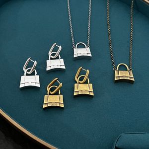 Nouveau conçu Lock Pendentif collier Cuivre plaqué or 18 carats métal brillant X lettres luxe femmes hommes boucle d'oreille Couple Designer Bijoux bb0321