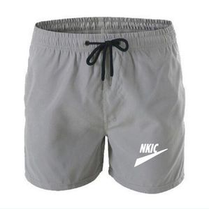 Nuevo diseñador de verano Pantalones cortos para hombre Gimnasio Hombres Deportes NK Diseñador atlético Correr Deporte Fitness Playa Baloncesto Jogging Hombre Pantalones cortos sueltos de gran tamaño 4XL