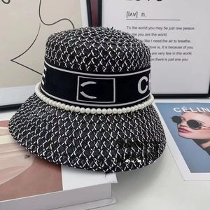 Nouveau élégant lettre seau pêcheur chapeau de paille femme printemps et été voyage parasol style japonais et Internet-célèbre chapeau de protection solaire noir et blanc