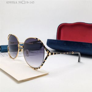 Nuevo diseñador de moda gafas de sol para mujer 0595 montura grande montura redonda hueca gafas populares simples lentes uv400 de alta calidad gafas para exteriores