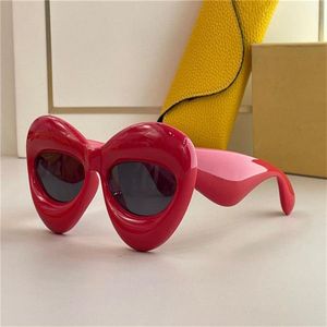 Nouvelle mode lunettes de soleil 40097 design spécial couleur lèvres forme cadre style avant-gardiste fou intéressant avec case283i