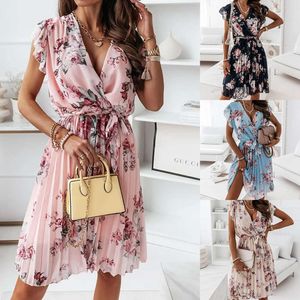 Nouveau Manches flottantes enveloppé taille fragmentée fleur robe plissée