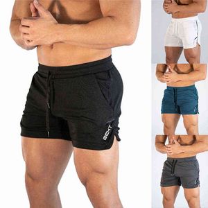 Nouveaux shorts de fitness pour hommes Exercice de gymnastique d'été pour hommes Respirant Metting Séchage rapide Sportswear Jogging Beach Shorts H1206