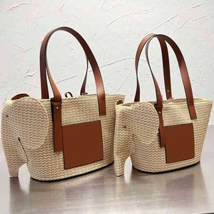 NUEVOS bolsos de hombro Totes Bolso de tejido de verano Moda Elefante Decoración Bolso de cubo tejido Bolsos de diseñador de mujer Bolsos cruzados Bolsos de compras Monedero 220629