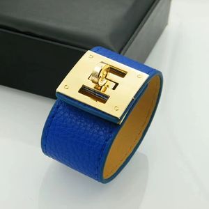 Nuevo brazalete grueso de la marca de moda PU Pu brazalete de cuero ancho para la pulsera de diseñador de acero de titanio de alta calidad para hombres
