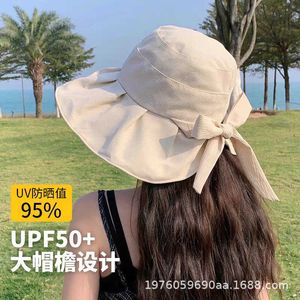 Nouveau chapeau de pêcheur pour femmes pour le printemps et l'été Version coréenne Bow Protection solaire Sunshade Colorful Rubber Tourism Big Eaf