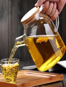 La plus récente théière en verre borosilicaté résistant à la chaleur bouilloire résistante au froid théière en bambou à double usage pour les fournitures de café en gros6667771