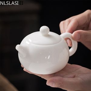 NLSLASI Chino Hecho a mano Tetera de porcelana blanca Marfil Té Pot Cerámica Teaware Infuser Pu'er Oolong Filter Kettle 210813