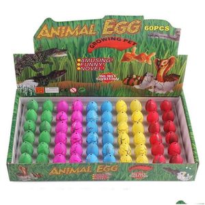 Juegos de novedad Juego de juguetes 60 paquetes de huevos de dinosaurio juguetes para incubar huevos de dinosaurio crecen en grieta de agua con una piscina de colores surtidos Entrega de entrega Gi DHQ7I