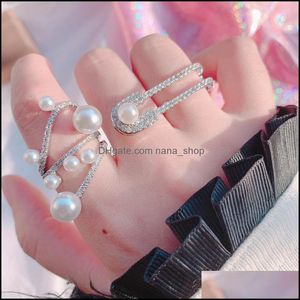 Otros accesorios de moda 425 Pearl Womens Net Red Cool Wind Rotating Index Finger Ring Zircon Micro Set Drop Delivery 2021 L7Z2L
