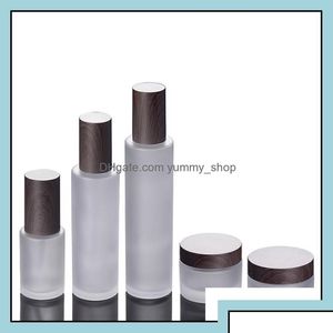 Bouteilles d'emballage Pompe de bocaux cosmétiques en verre givré avec capuchon en bois en plastique 30g 50g 30ml 100 ml