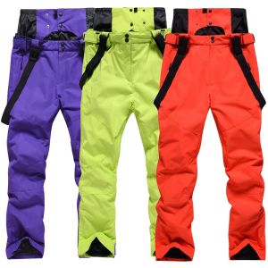 Pantalons 2024 Outdoor Mountain Man Snowboard Bibs Pantalons Windproof Femme Jumps Cuit imperméable Saut-salles Sport des femmes de ski