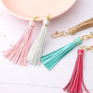 Party Favor 18 couleur pendentif pompon en cuir enveloppé long bracelet de perles de silicone accessoires PU cuir gland porte-clés T2I52785