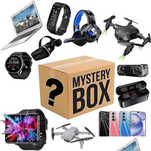 Party Favor Mystery Box Boîtes électroniques Anniversaire aléatoire Surprise Faveurs Chanceux pour Adts Cadeau Drones Smart Watch O1 Drop Livraison H Dhg1P Meilleure qualité