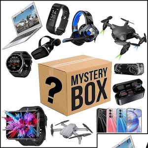 Party Favor Mystery Box Boîtes électroniques Anniversaire aléatoire Surprise Faveurs Chanceux pour Adts Cadeau Drones Smart Watch Otvpy Meilleure qualité