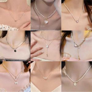 Collier de perles pour femmes colliers de créateurs niche polyvalente haut de gamme chaîne de pull en perles style Ins nouveau tempérament accessoires de chaîne de cou