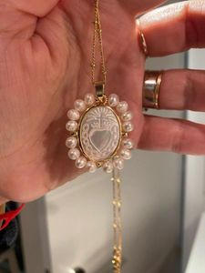 Collares pendientes 50 piezas precio al por mayor corazón sagrado Natural Guadalupe Grace madre perla collar de agua dulce señora para regalo